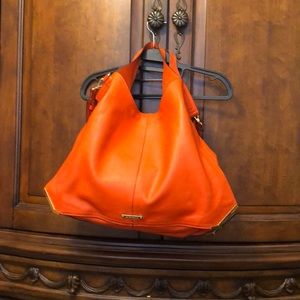 Limited edition of Vince Camuto  leather bags .